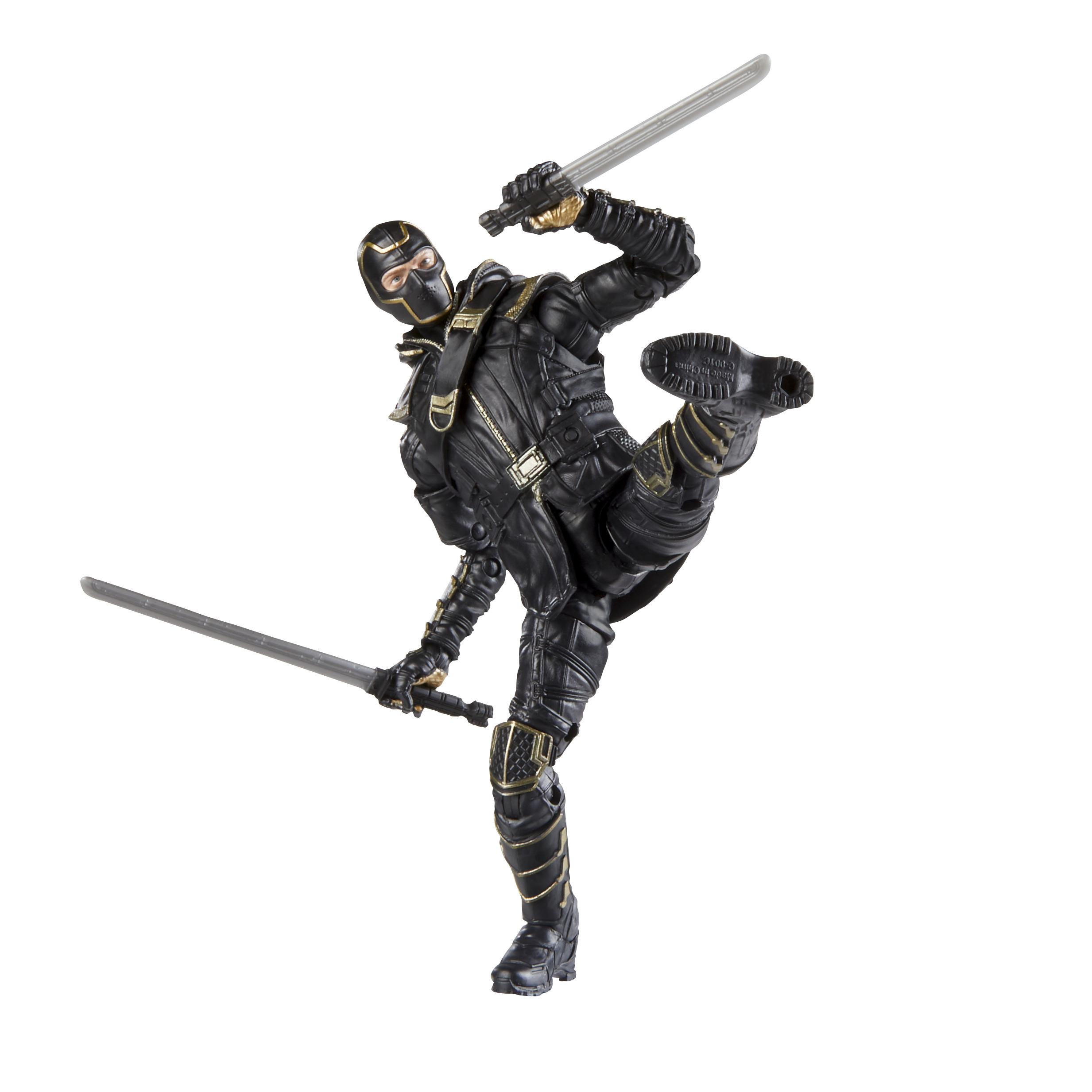 Figurka akcji ninja w dynamicznej pozie, trzymająca dwa miecze. Figurka jest czarna i złota.