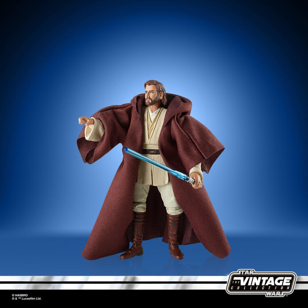 Figura di Obi-Wan Kenobi in abiti marroni, spada laser, sfondo blu.