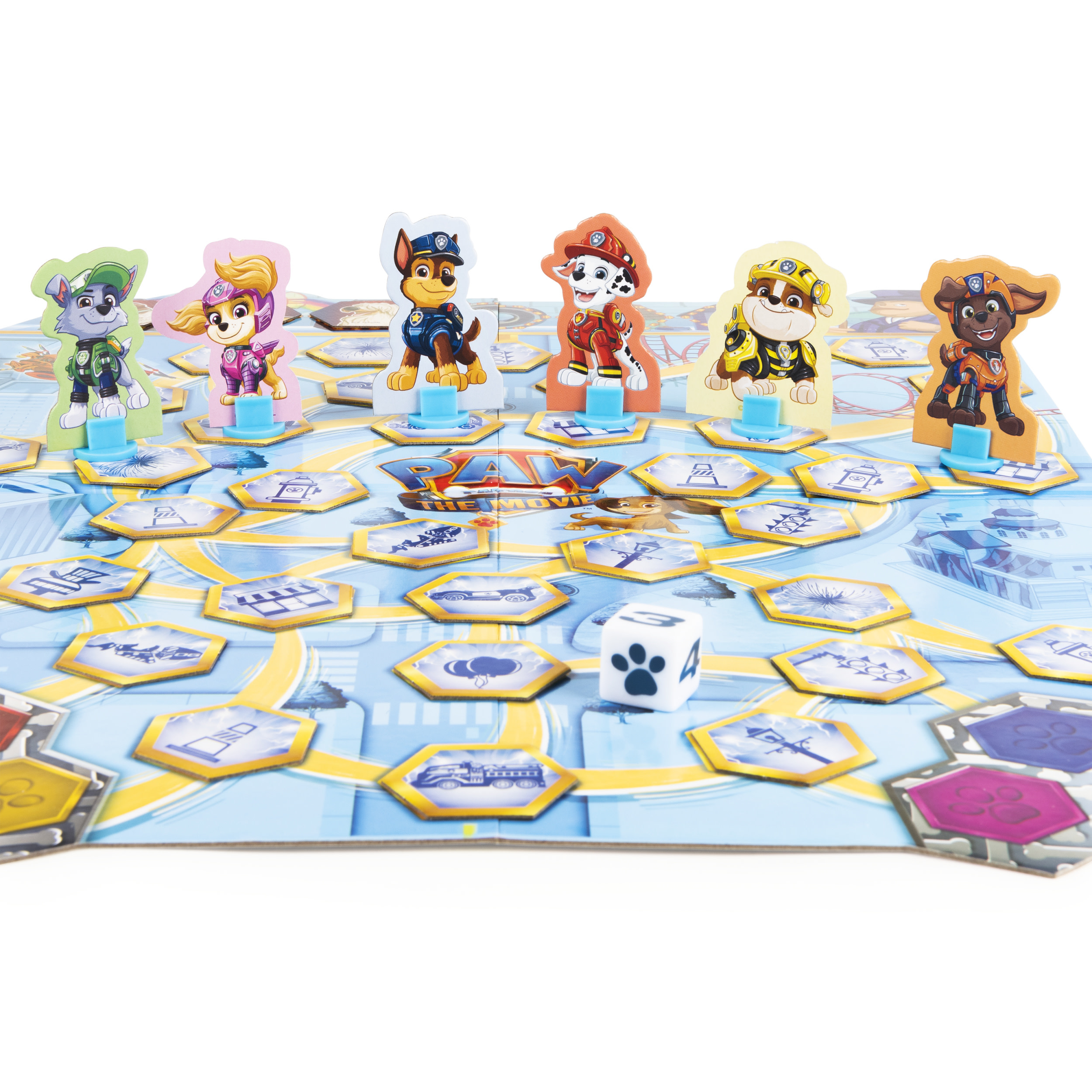 Paw Patrol Brettspiel mit Spielfiguren und einem Würfel. Spielbrett zeigt eine Stadtszene.