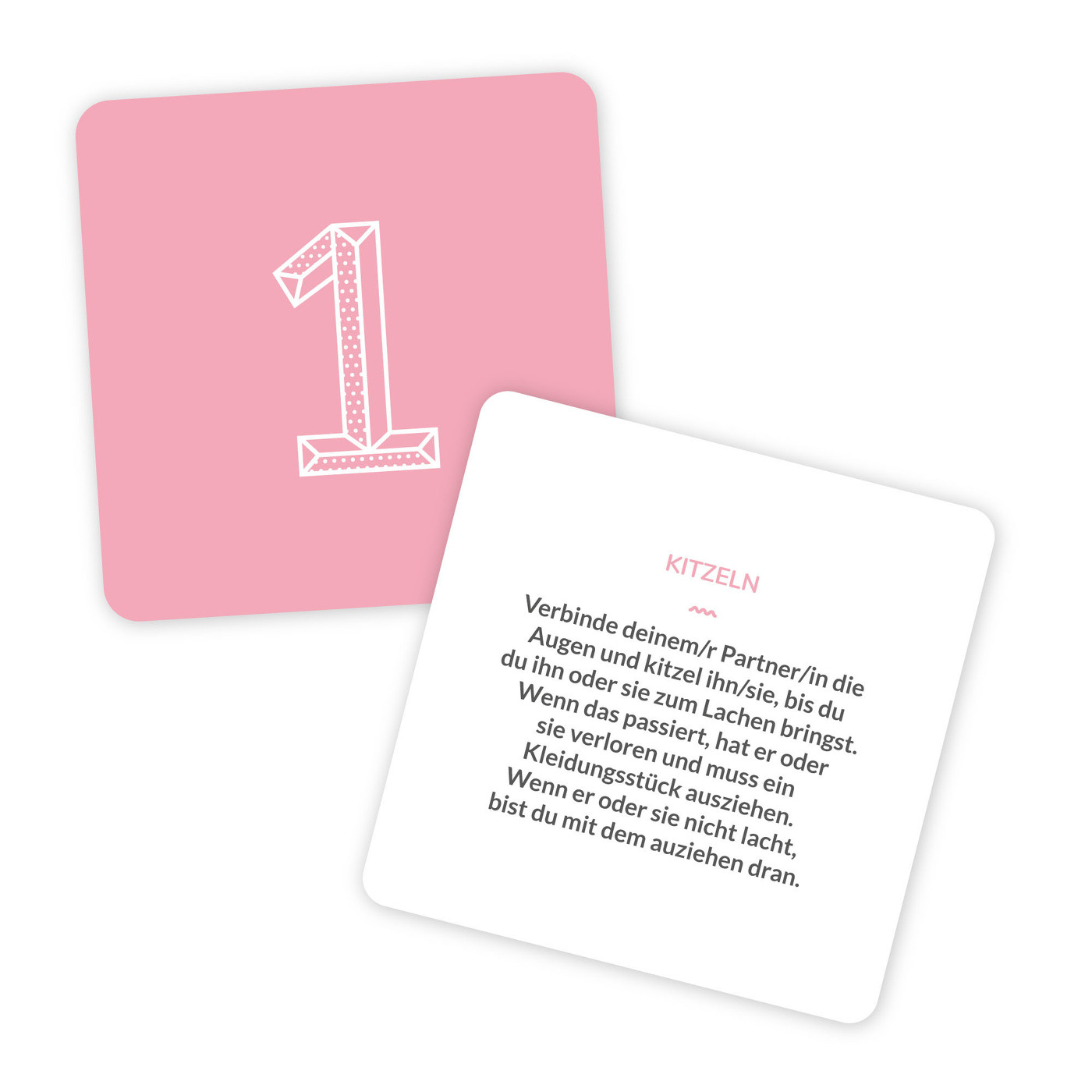 Zwei Karten; eine rosa mit weißer '1' und eine mit deutschem Text über Kitzeln.