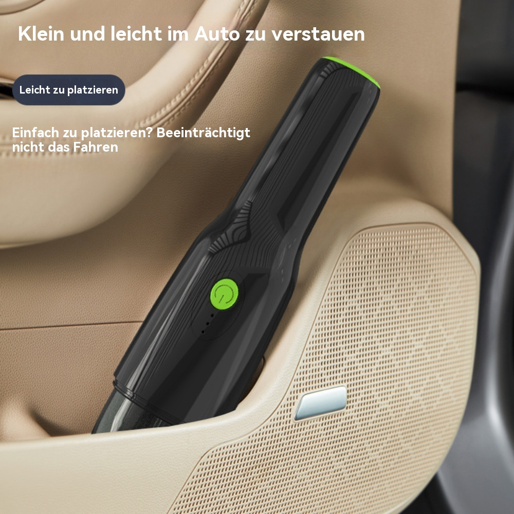 Schwarzer und grüner Autostaubsauger in einer Autotür-Tasche.