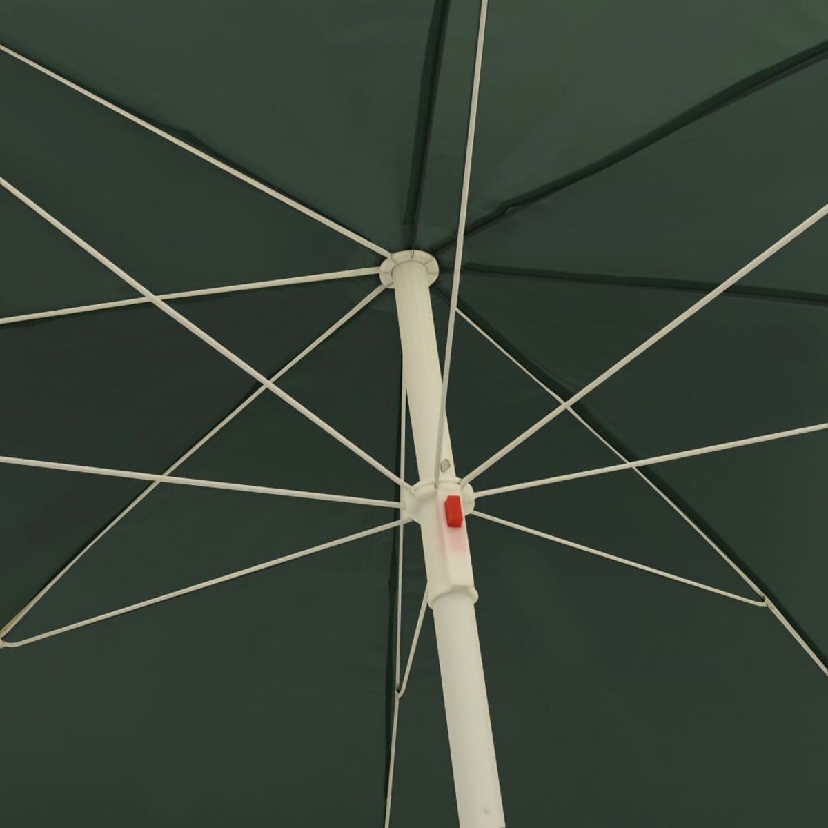 Vista interna di un ombrello verde. Telaio bianco e bottone rosso visibili.