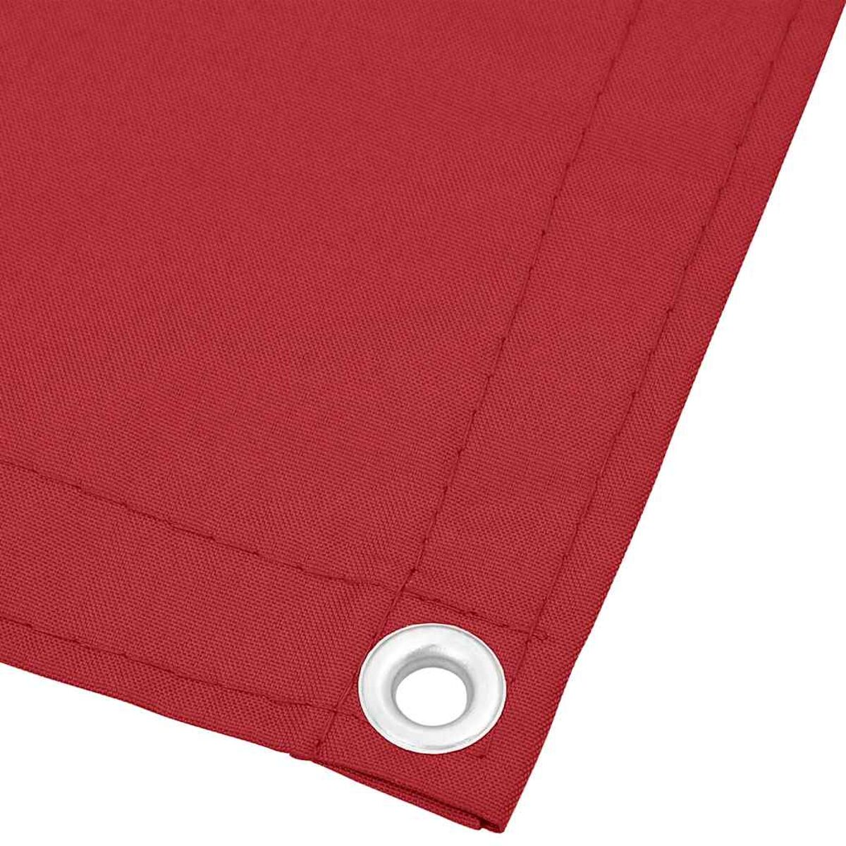 Primo piano di tessuto rosso con un occhiello metallico nell'angolo. Il tessuto ha una superficie strutturata.
