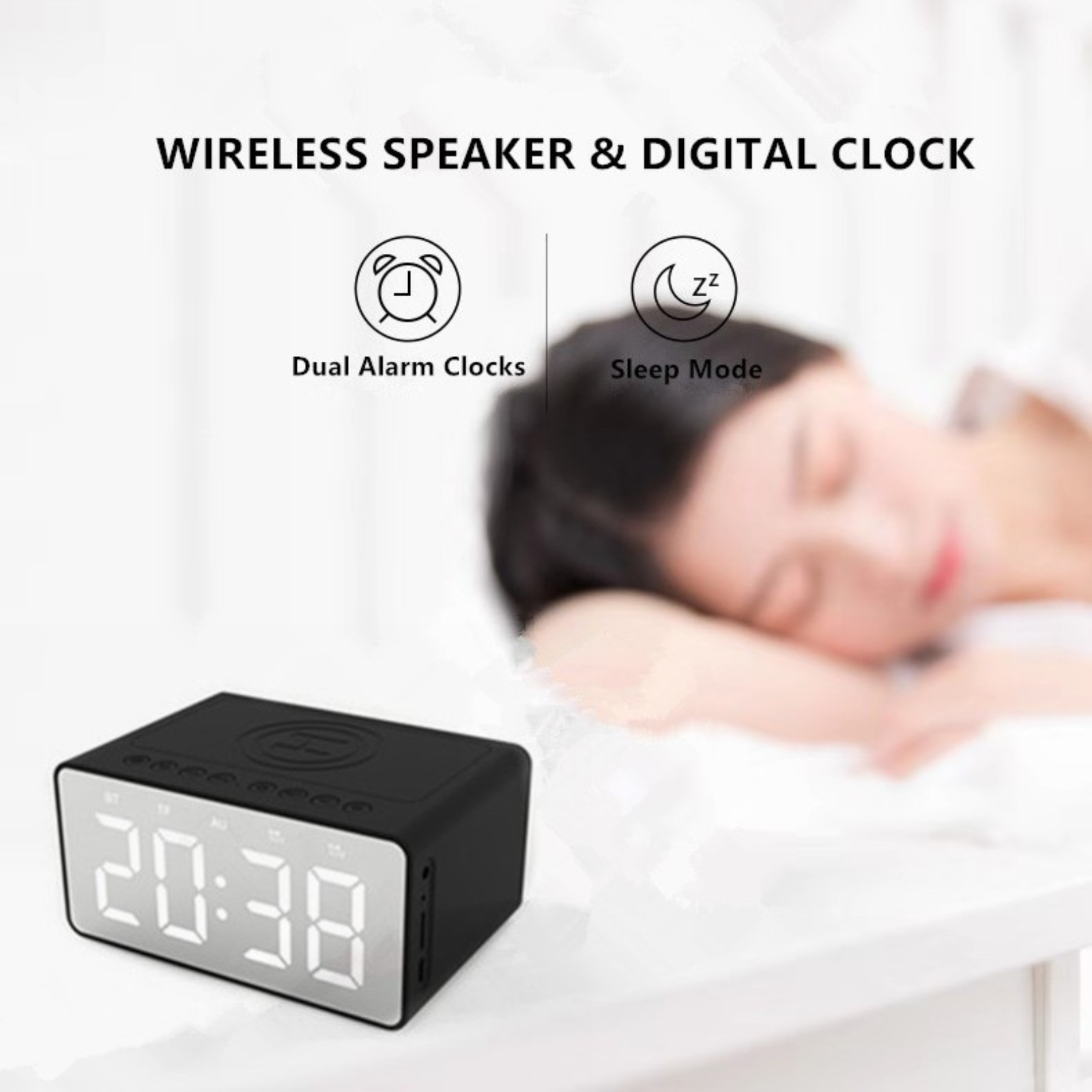 Schwarzer kabelloser Lautsprecher mit Digitaluhr und schlafender Person im Hintergrund.