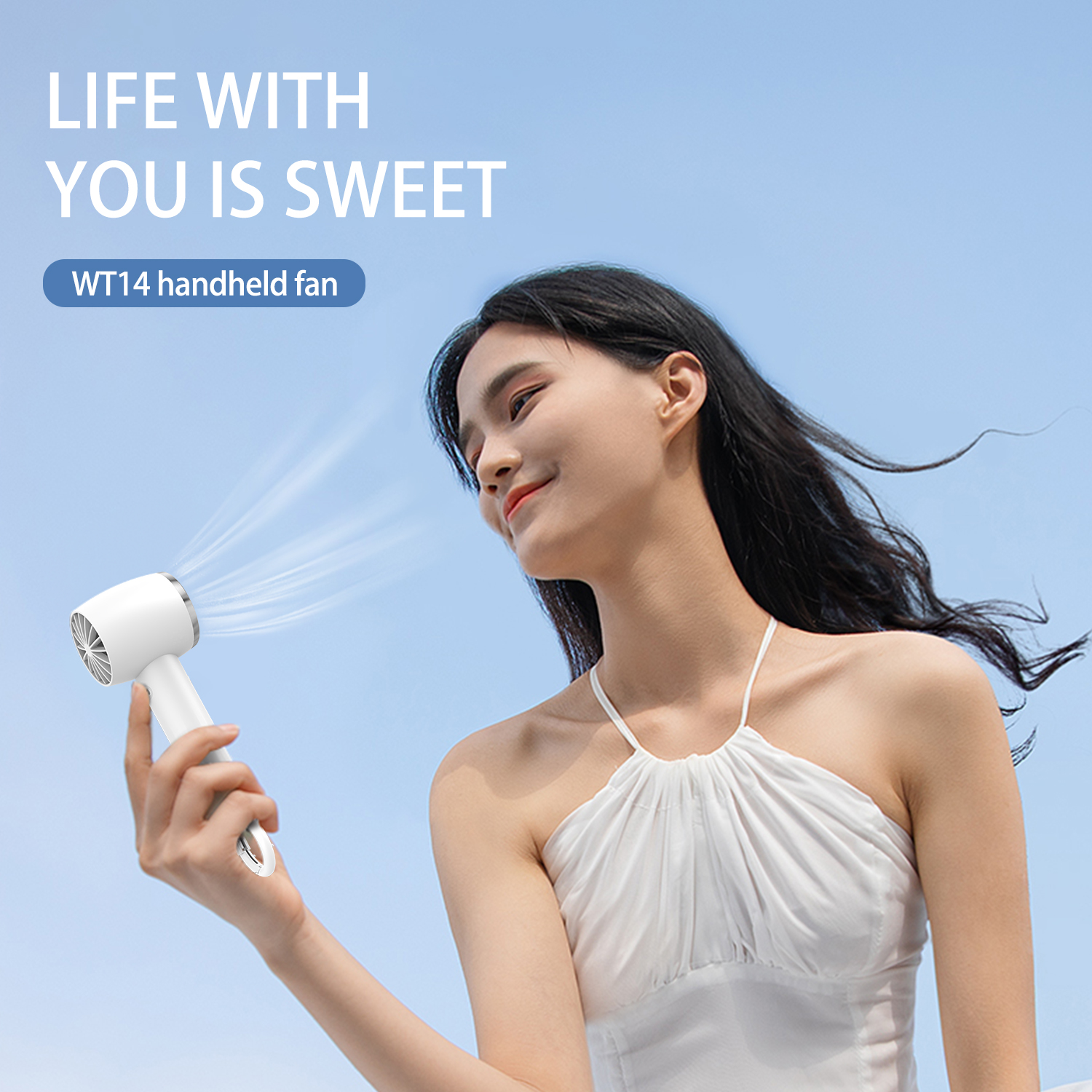 A woman smiling, holding a white handheld fan. Text says 'LIFE WITH YOU IS SWEET' and 'WT14 handheld fan'.