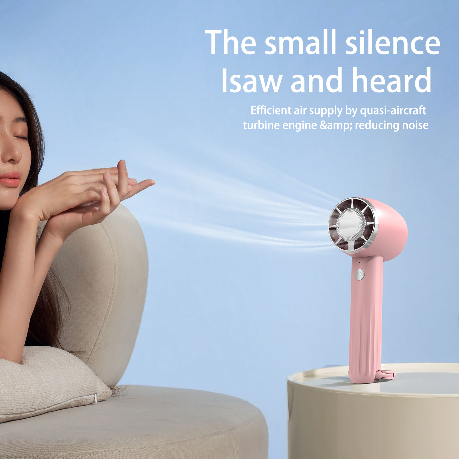 A woman is looking at a small pink fan with the text: The small silence I saw and heard.