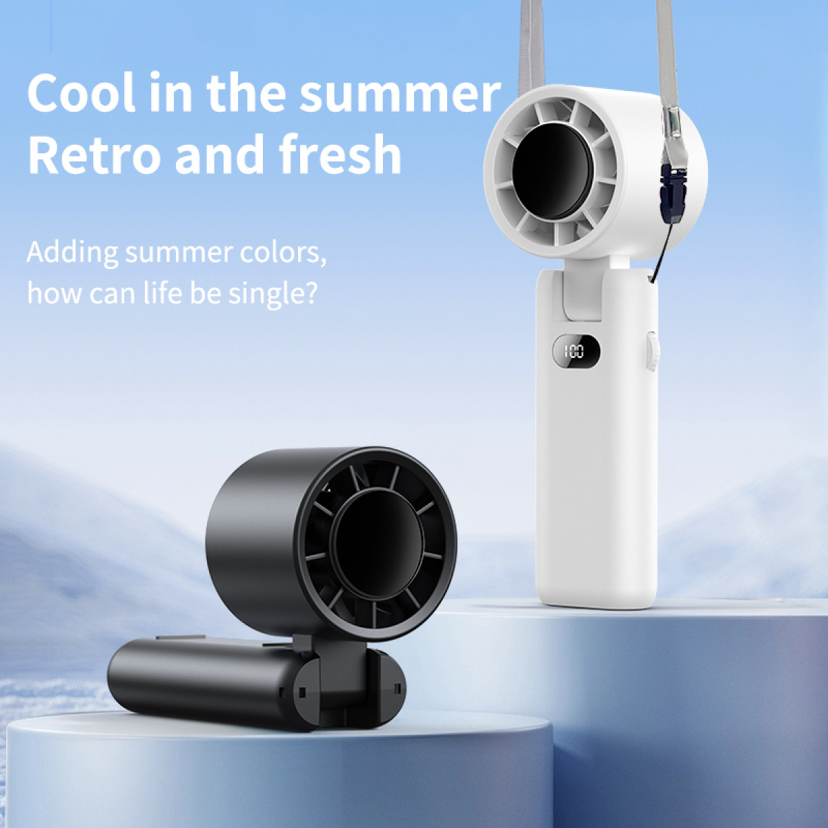 Two portable fans, one black and one white, with a text about retro and fresh summer.