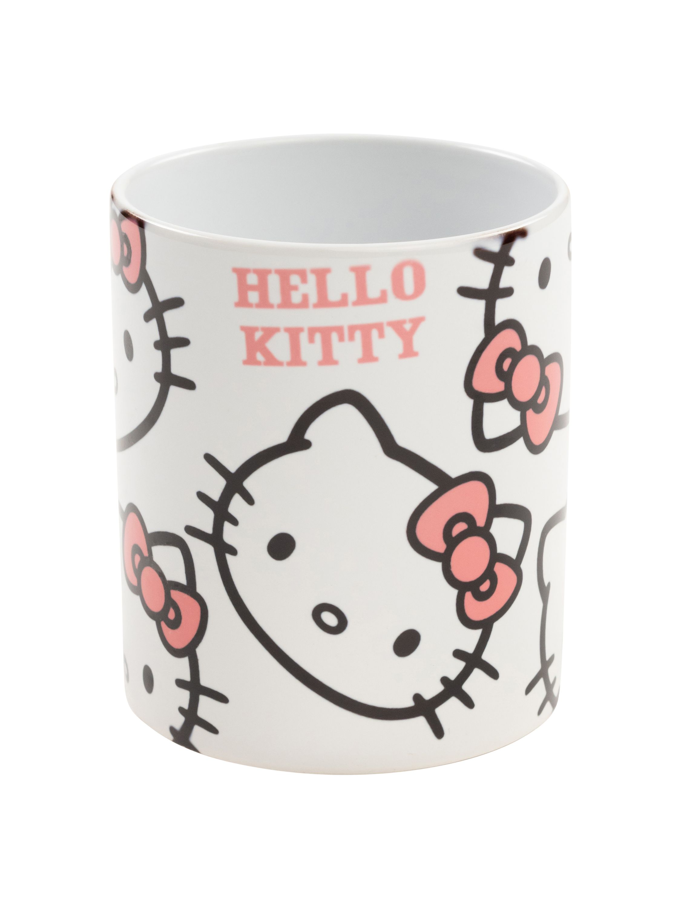 Eine weiße Tasse mit Hello Kitty-Gesichtern und Schleifen bedruckt. Das Hello Kitty-Design ist rosa.