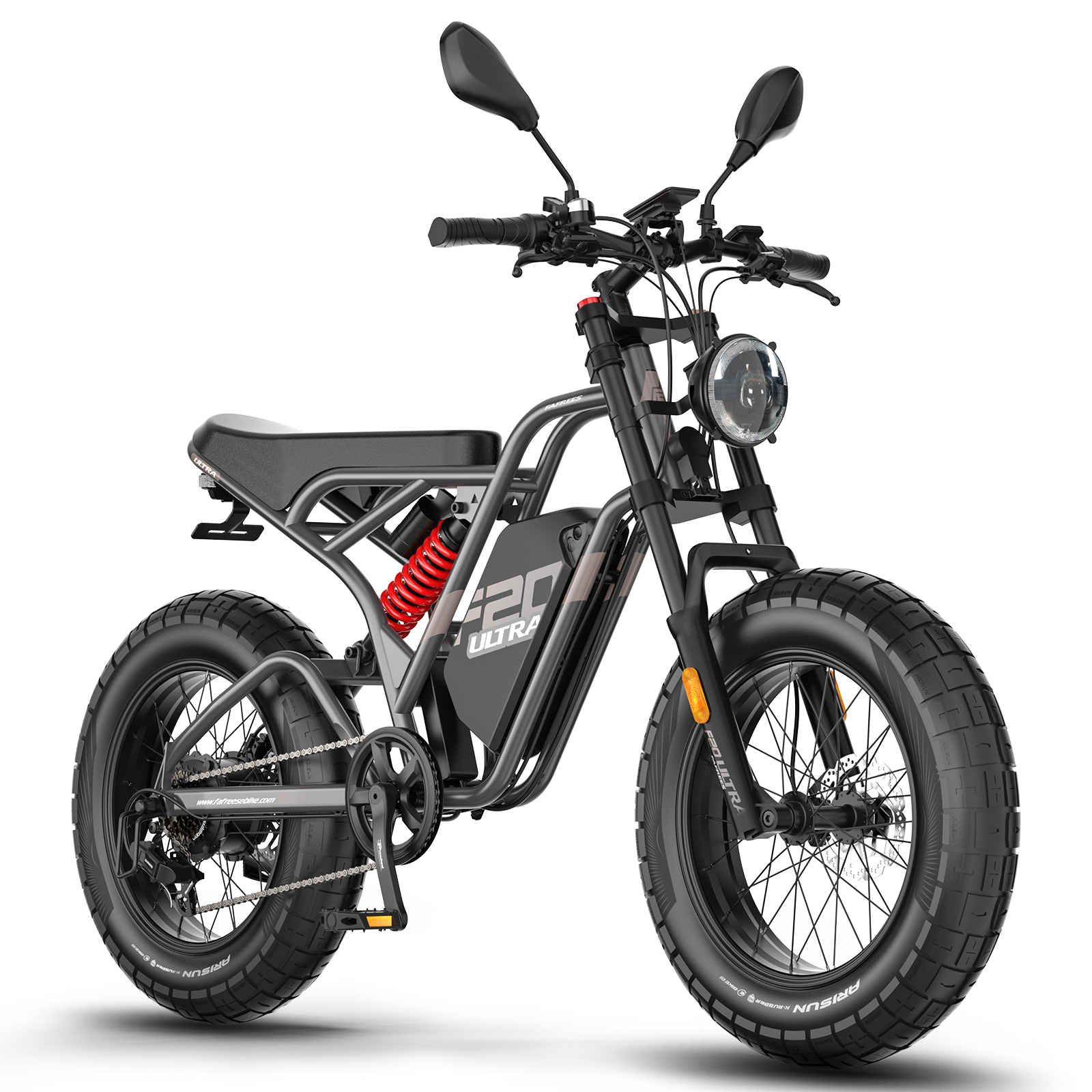 Motocicleta eléctrica negra, neumáticos anchos, resorte rojo, faros, fondo blanco.