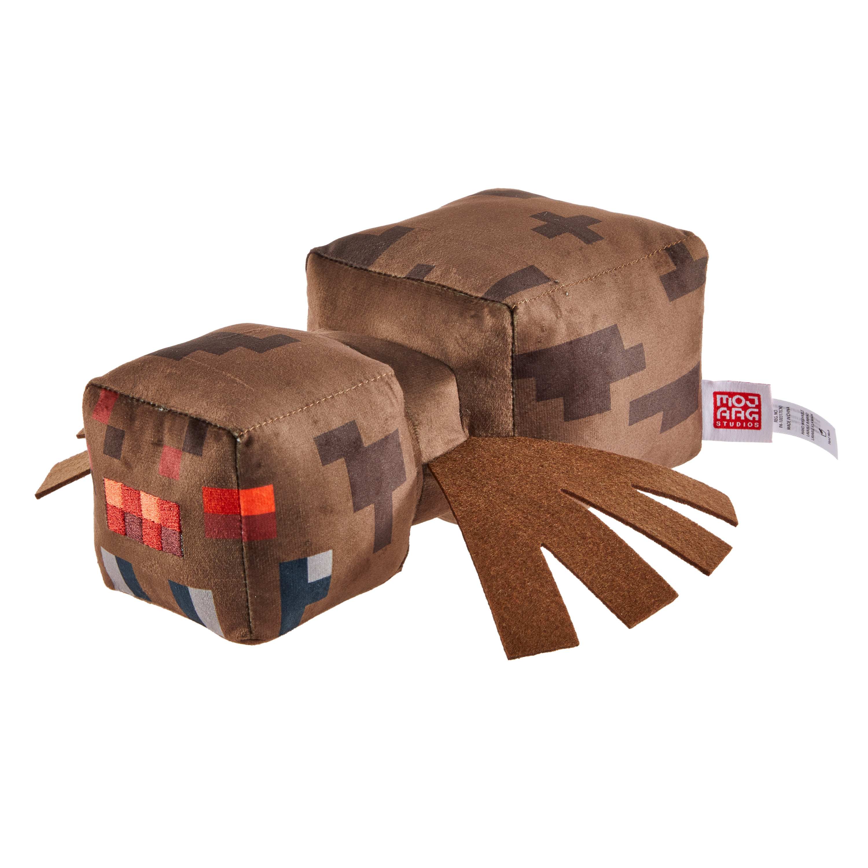 Ein Minecraft Creeper Plüschtier wird gezeigt, braun mit pixeligem Design, liegt auf der Seite. Mojang Studios.