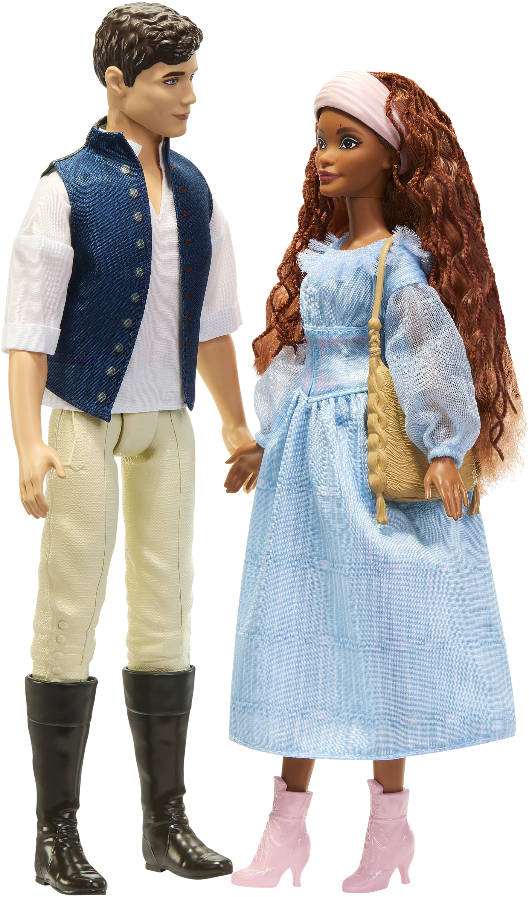 Due bambole, un uomo e una donna. L'uomo indossa un gilet e pantaloni, la donna un vestito blu e tiene una borsa.
