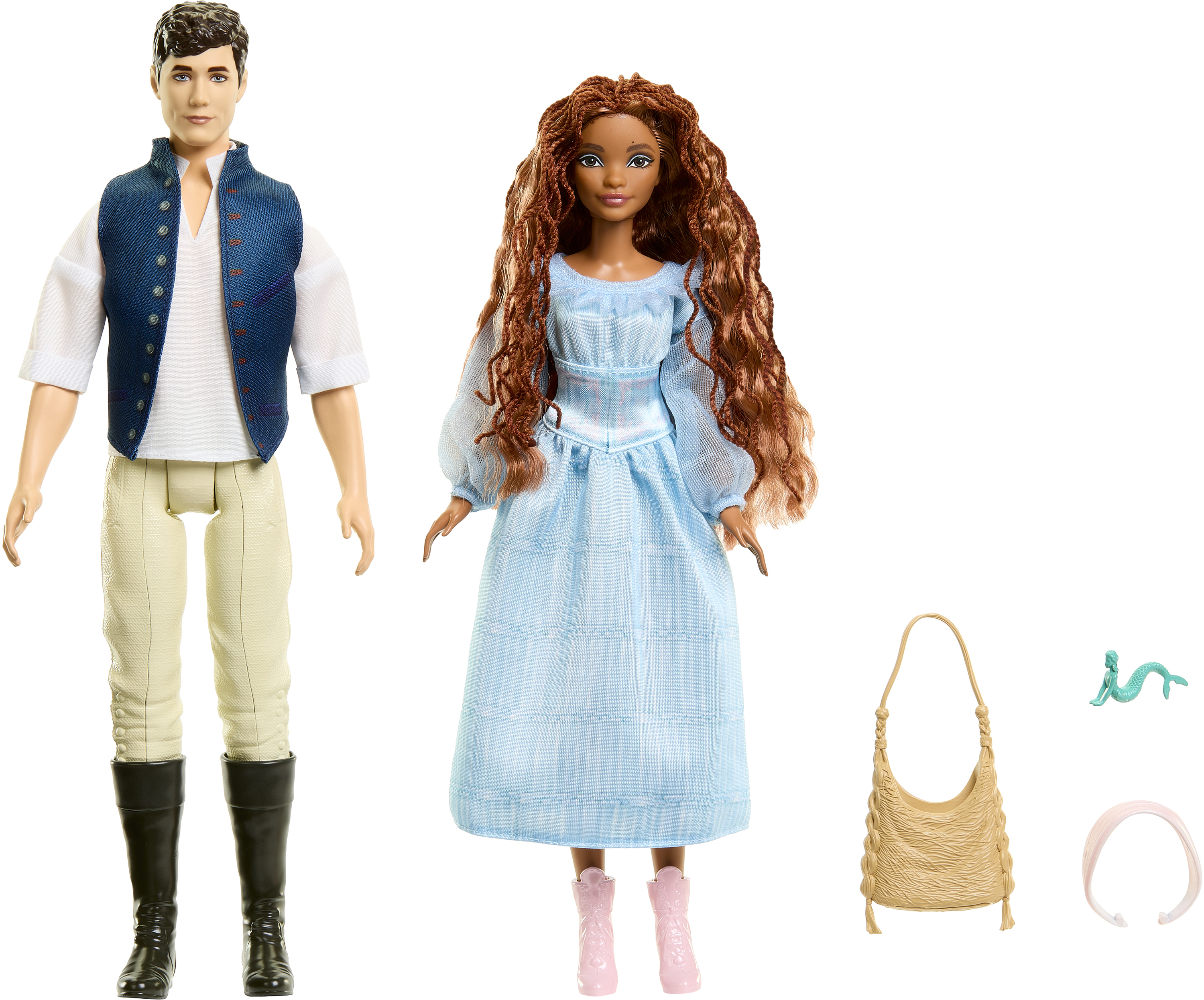 Due bambole Barbie sono mostrate; un uomo in gilet e pantaloni e una donna in abito blu.