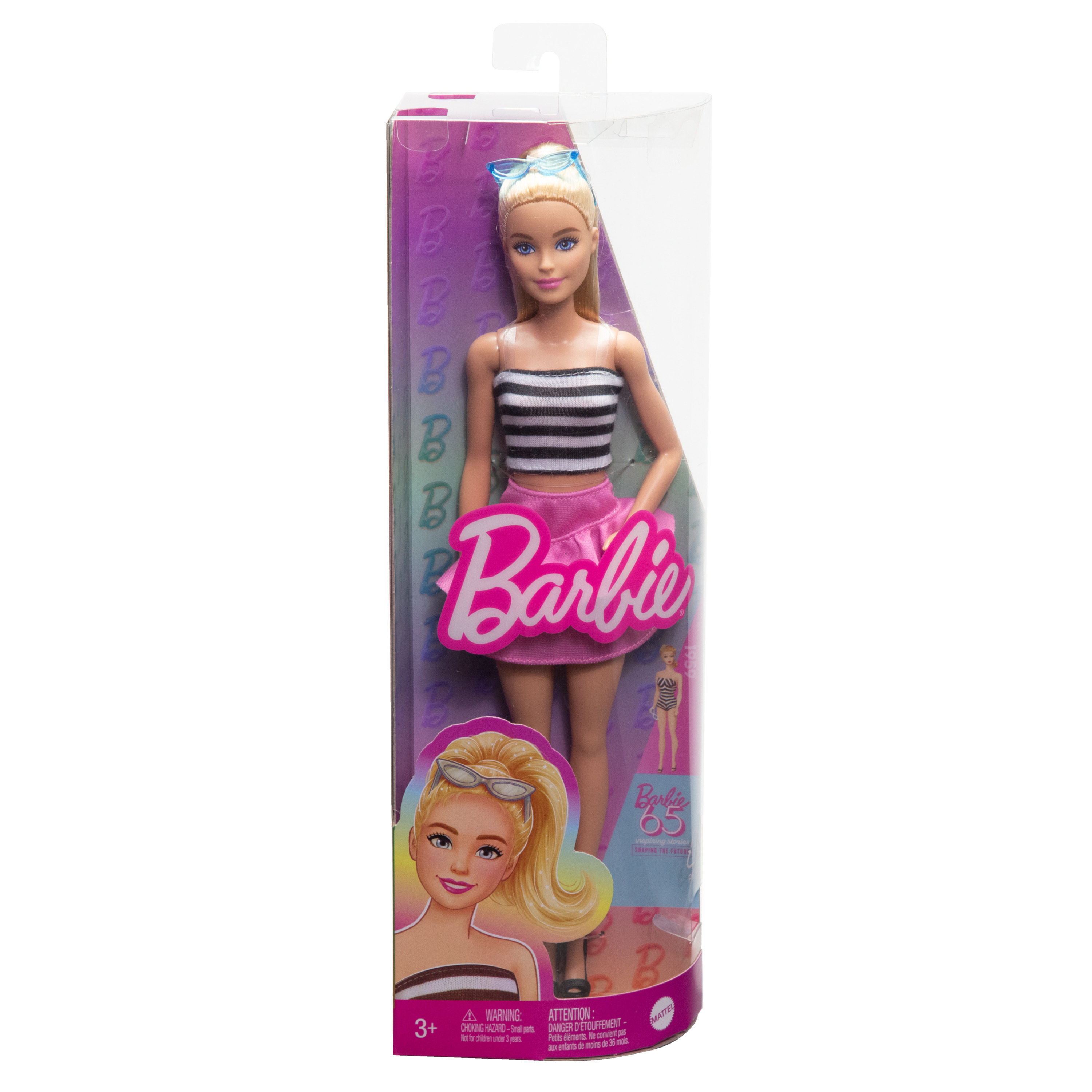 Barbie-Puppe in gestreiftem Oberteil und pinkfarbenem Rock in einer Schachtel.