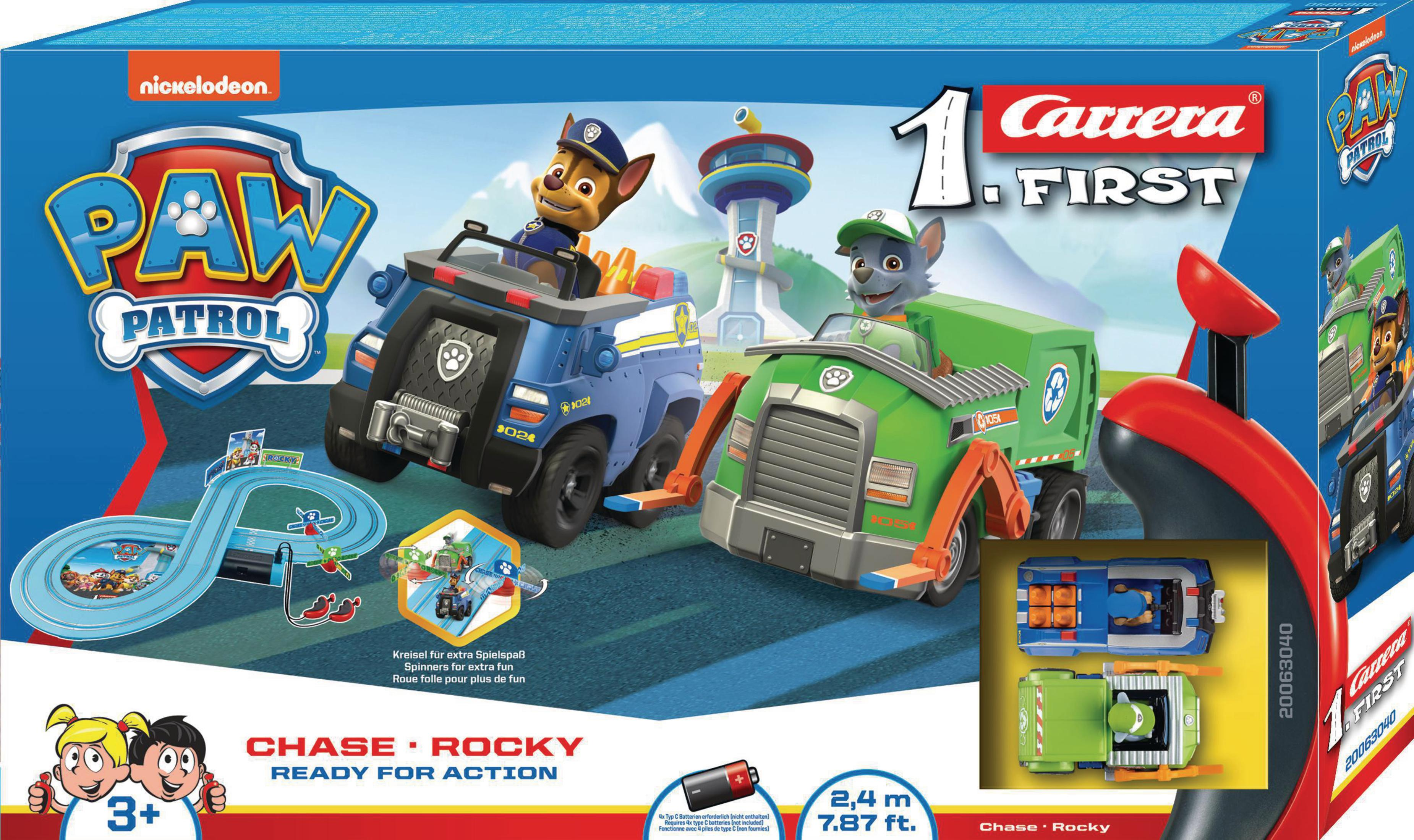 A toy set box with two Paw Patrol cars and a racetrack design, featuring Chase and Rocky.