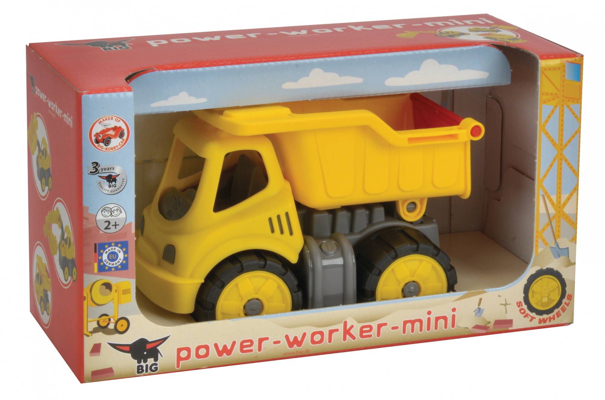 Żółta ciężarówka zabawka w pudełku. Na boku pudełka napis 'power-worker-mini'.