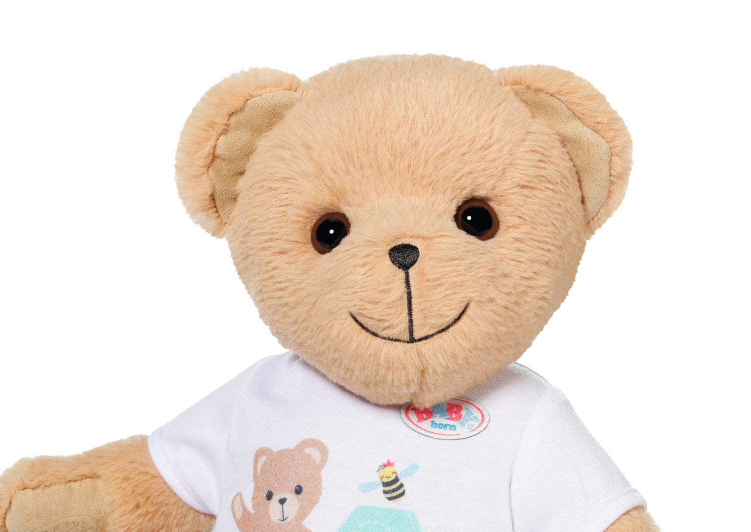 Ein Teddybär mit weißem Hemd, braunem Fell und schwarzen Augen. Das Hemd hat ein Cartoon-Bild.