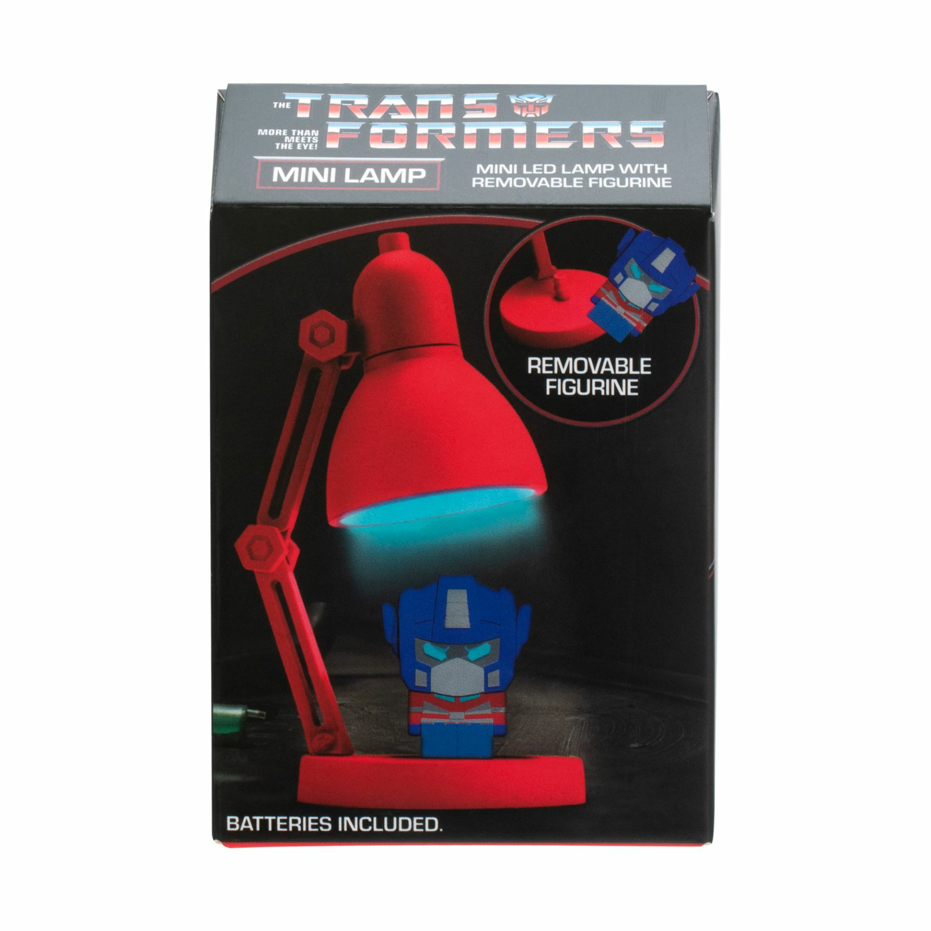 Eine rote Transformers-Mini-Lampe mit einer herausnehmbaren Optimus Prime-Figur in einer schwarzen Box. Batterien sind enthalten.