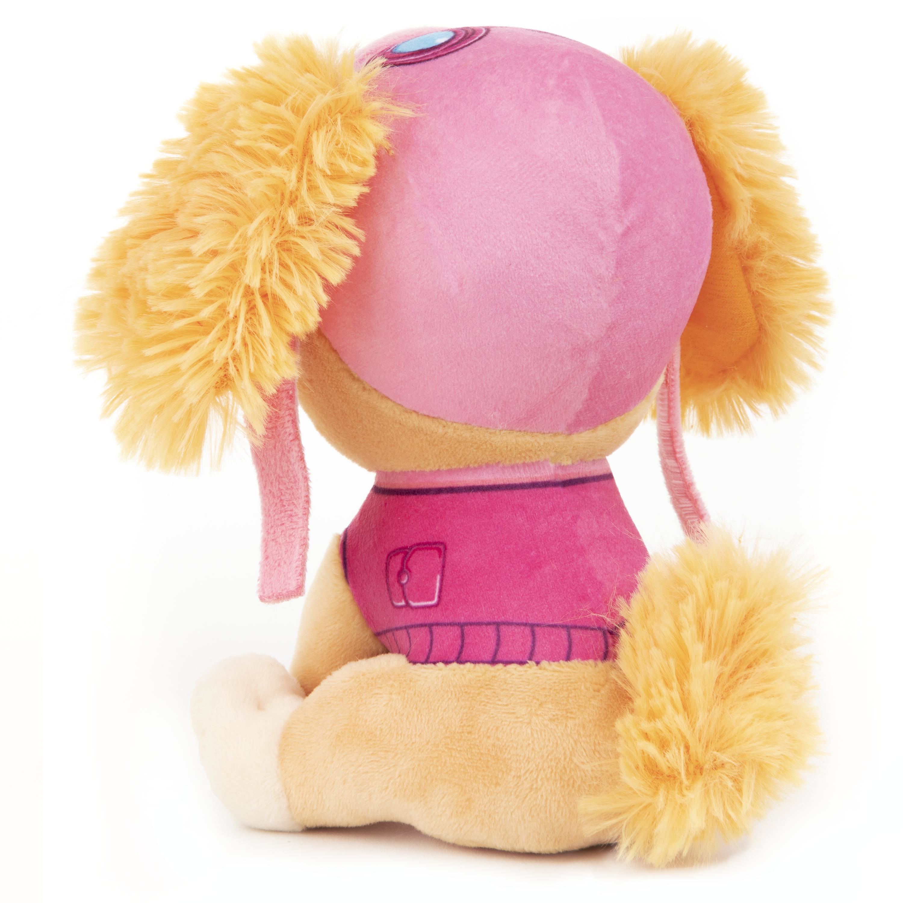 Rosa Stoffhundespielzeug, Seitenansicht, Pfoten und Ohren sichtbar.