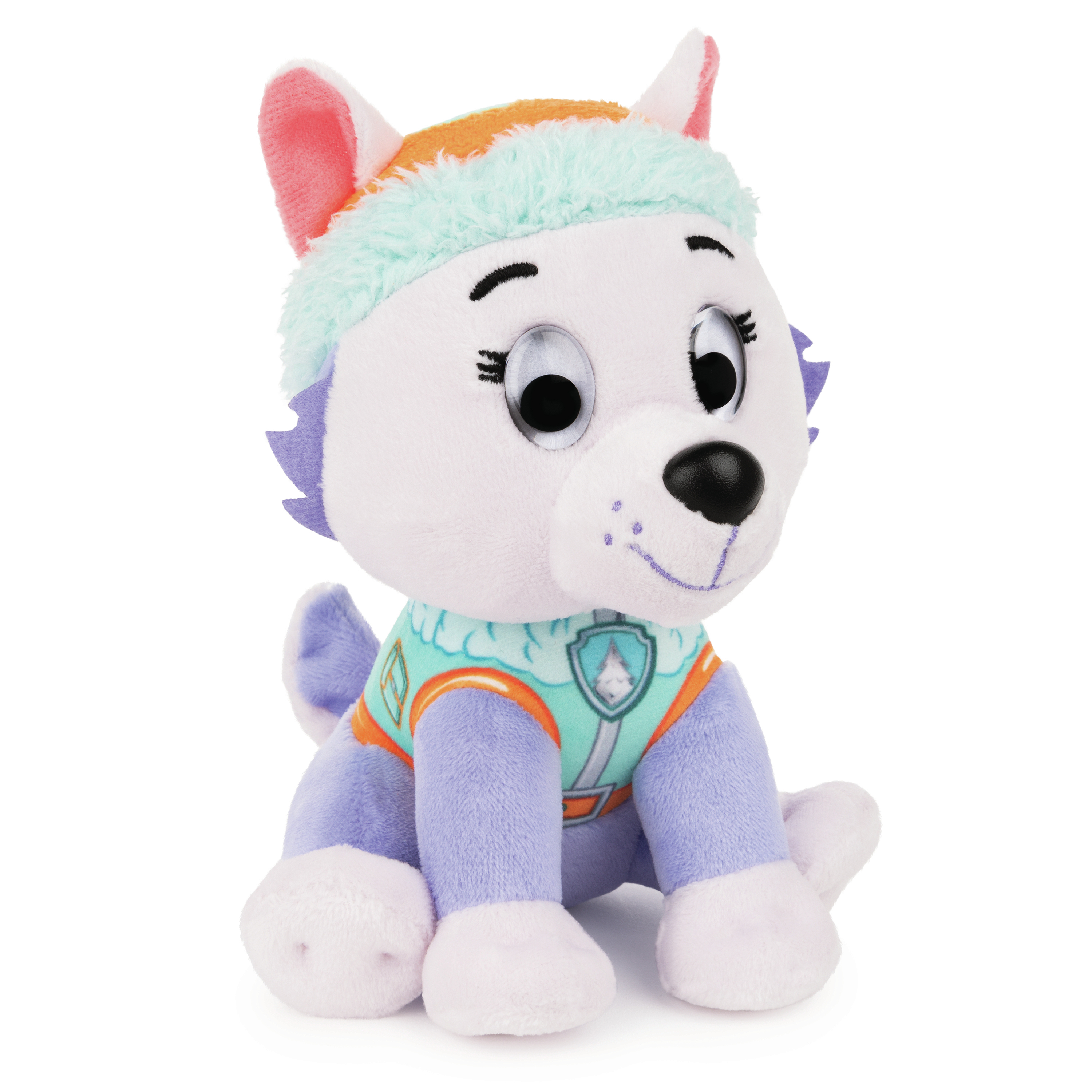 Ein Paw Patrol Everest Plüschtier, sitzend. Es ist ein weißer Welpe mit lila und blauen Akzenten.