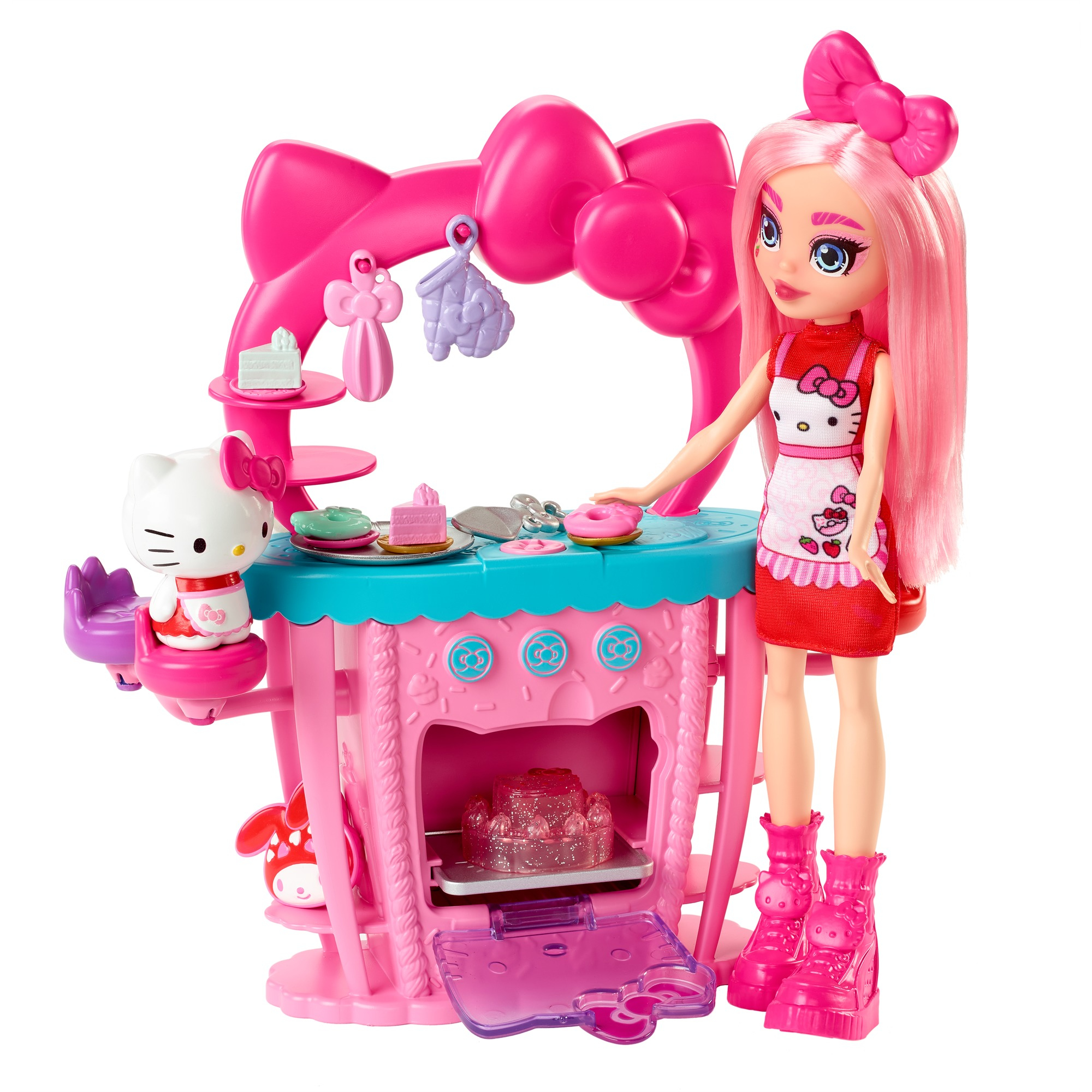 Una bambola di Hello Kitty e una bambola di ragazza con un set da cucina, con forno e dessert.
