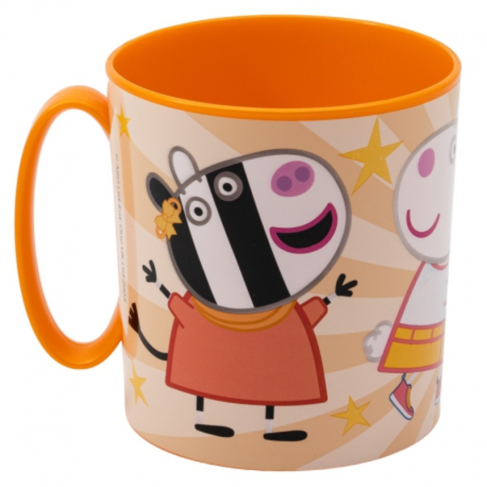 Taza naranja con diseño de Peppa Pig y cebra. El asa también es naranja. Estrellas y rayas en el fondo.