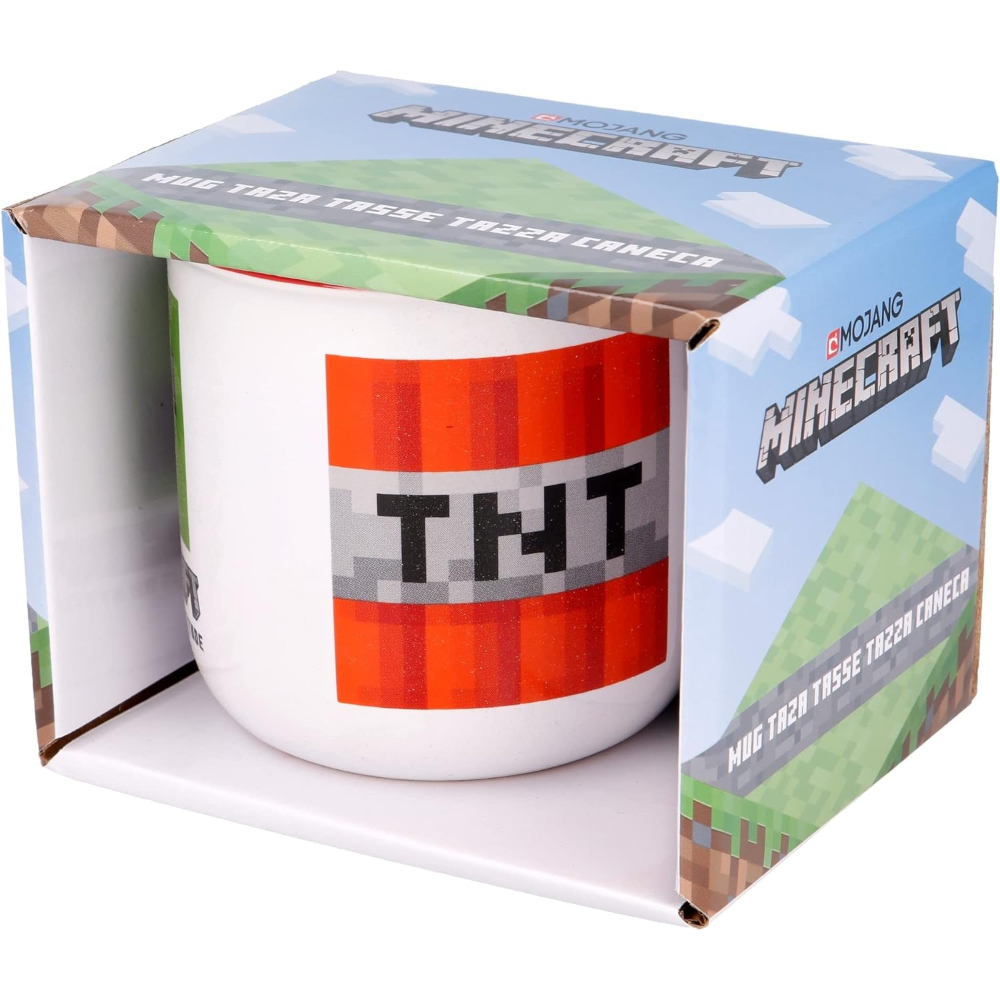 Taza TNT de Minecraft en una caja. La taza es blanca con diseño TNT rojo.