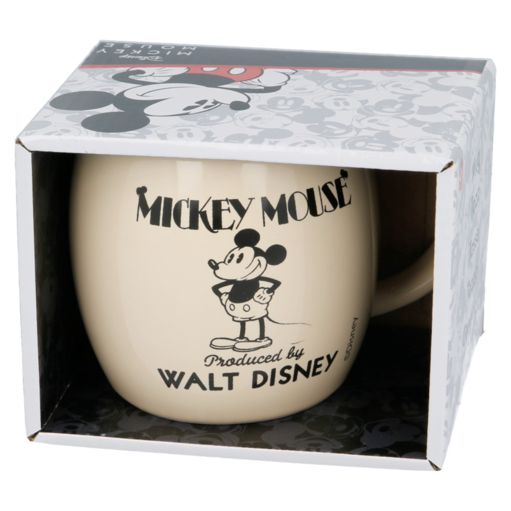 Una taza de Mickey Mouse en una caja. La taza muestra a Mickey Mouse y está en una caja con un diseño.