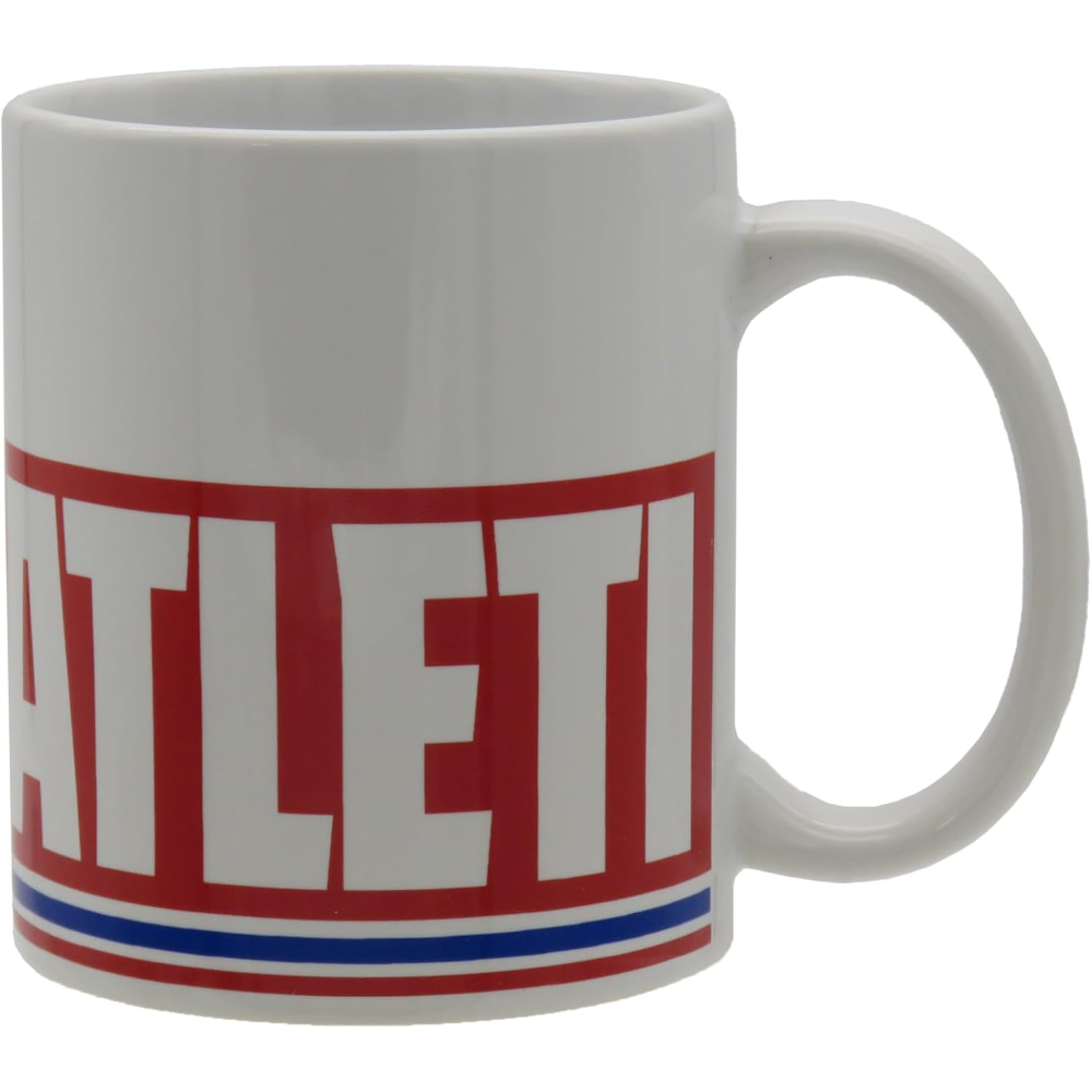 Una taza blanca con la palabra ATLETI en letras rojas y una franja azul y roja en la parte inferior.