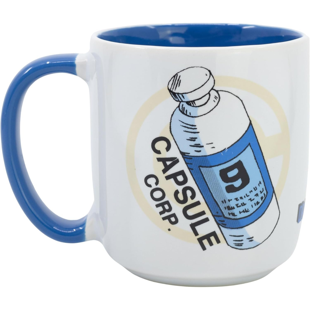 Taza blanca con interior y asa azules. Logotipo de Capsule Corp y una ilustración de cápsula.