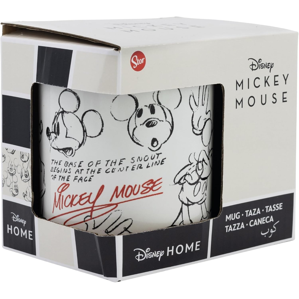Una taza con dibujos de Mickey Mouse, en una caja blanca y negra.
