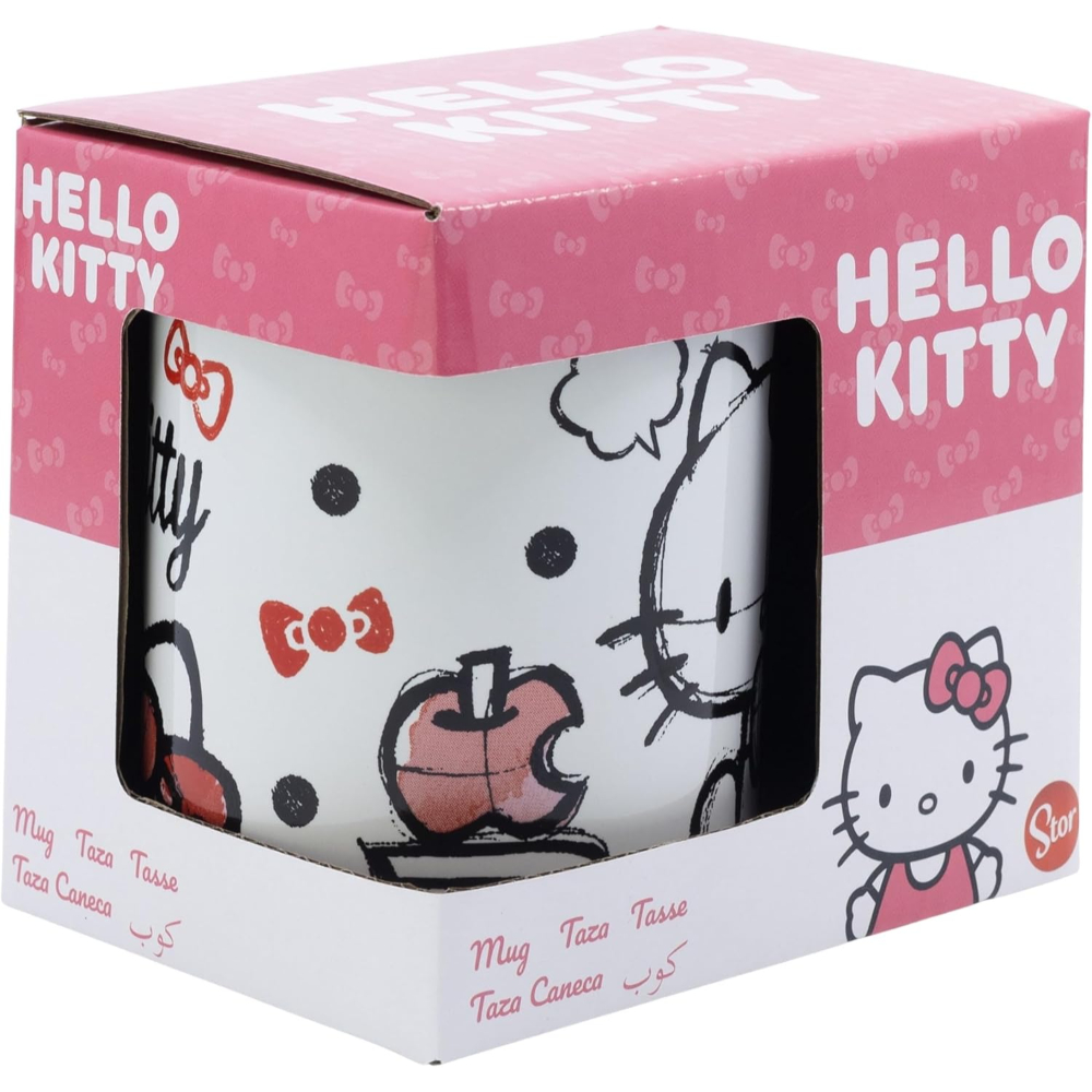 Taza de Hello Kitty en una caja. La taza tiene Hello Kitty, lazos y una manzana. Caja rosa.