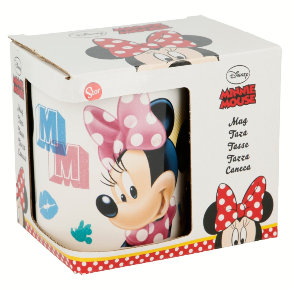 Una taza de Minnie Mouse en una caja. Minnie Mouse está en la taza. La caja es blanca con lunares.