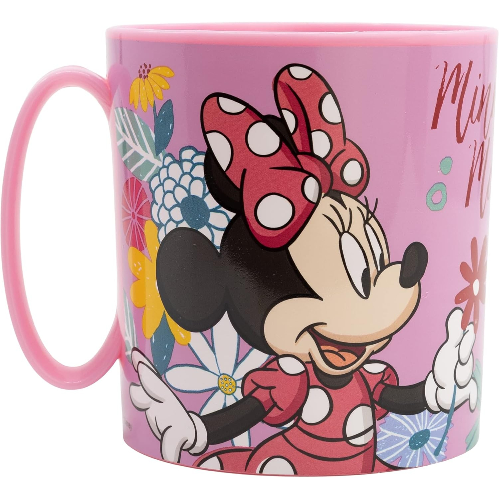 Taza rosa de Minnie Mouse. Minnie lleva un lazo rojo y un vestido con lunares blancos. Las flores la rodean.