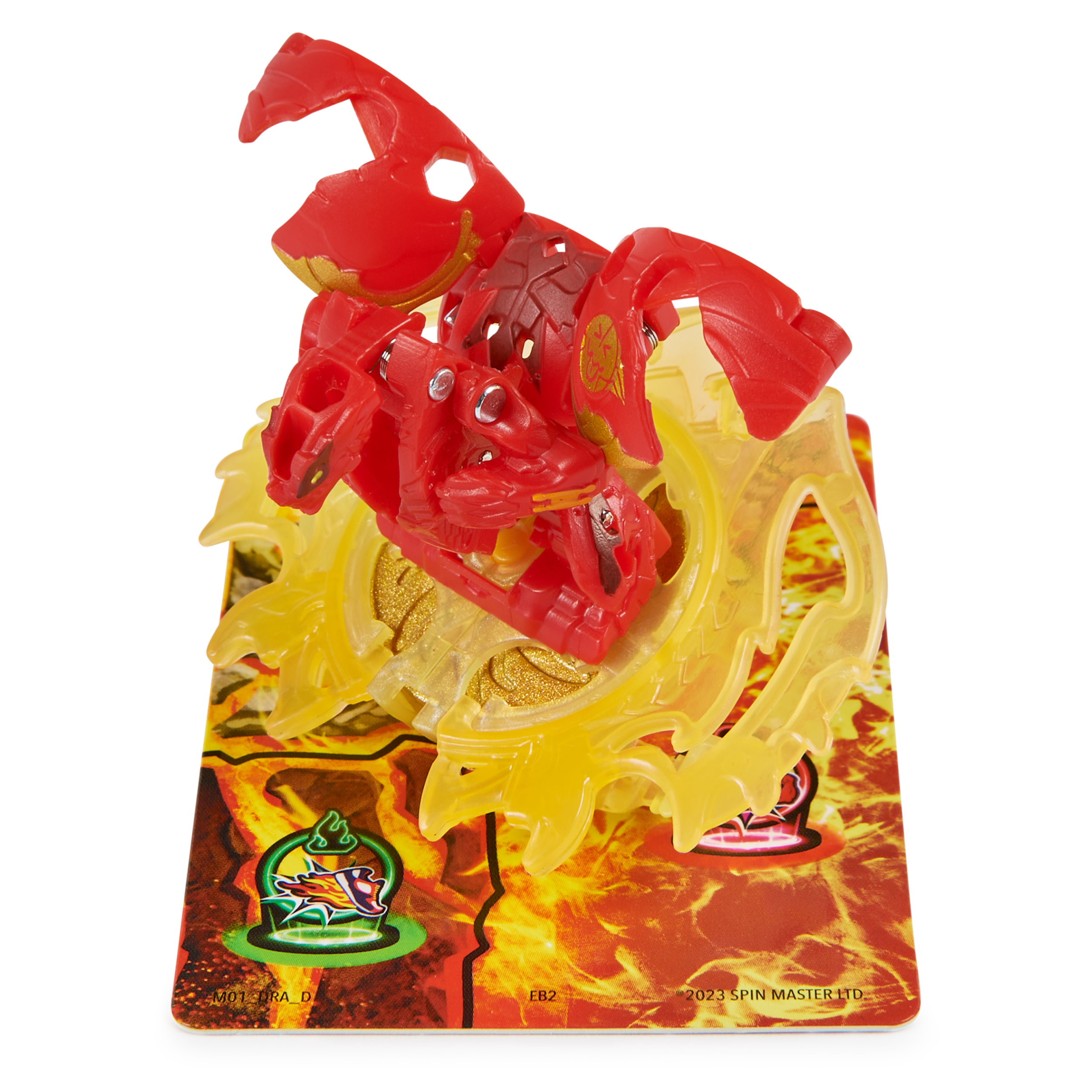 Un juguete de dragón rojo está en un tablero de juego con un patrón amarillo y rojo.