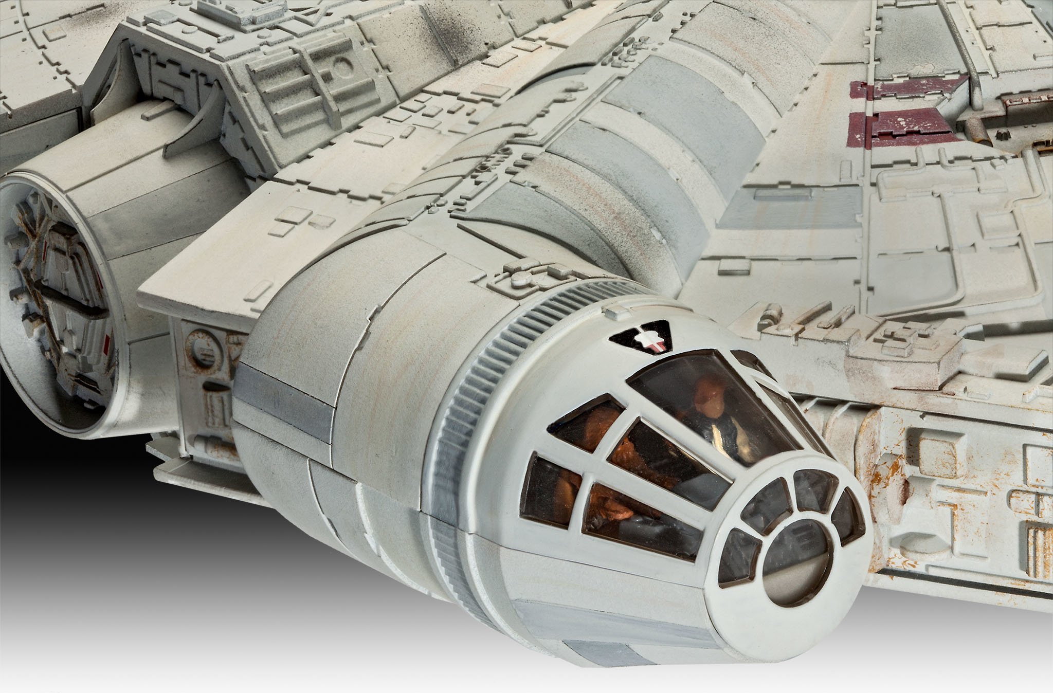 Star Wars Millennium Falcon model. Grijs en wit ruimteschip met cockpit.