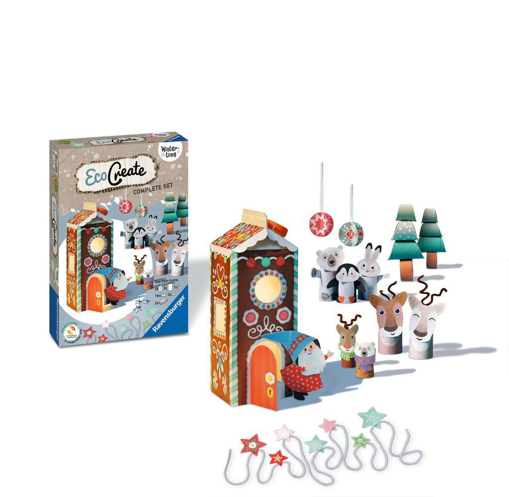 Set di artigianato a tema invernale Eco Create. La scatola mostra una casa di pan di zenzero e ci sono decorazioni.
