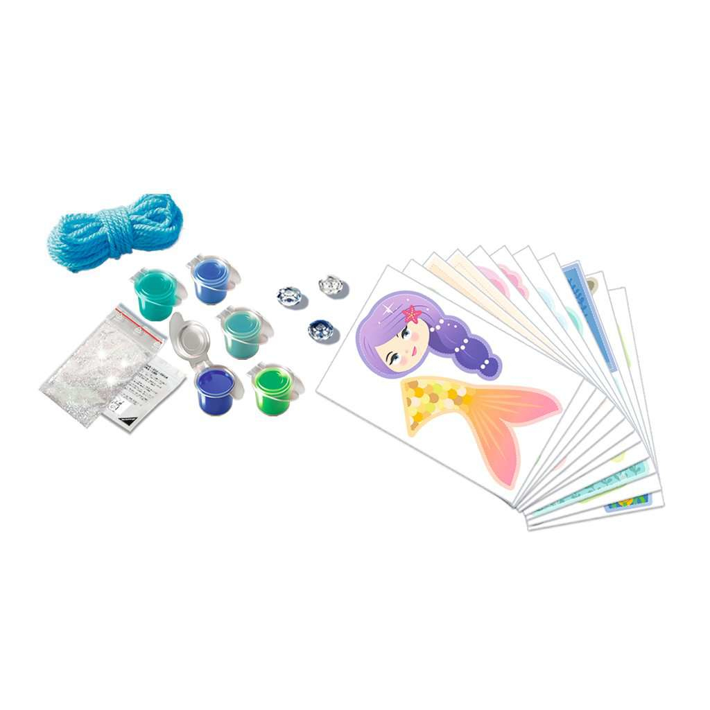 Meerjungfrau-Bastelset mit Farbe, Pinseln, Glitzer, Edelsteinen und Meerjungfrau-Designs.