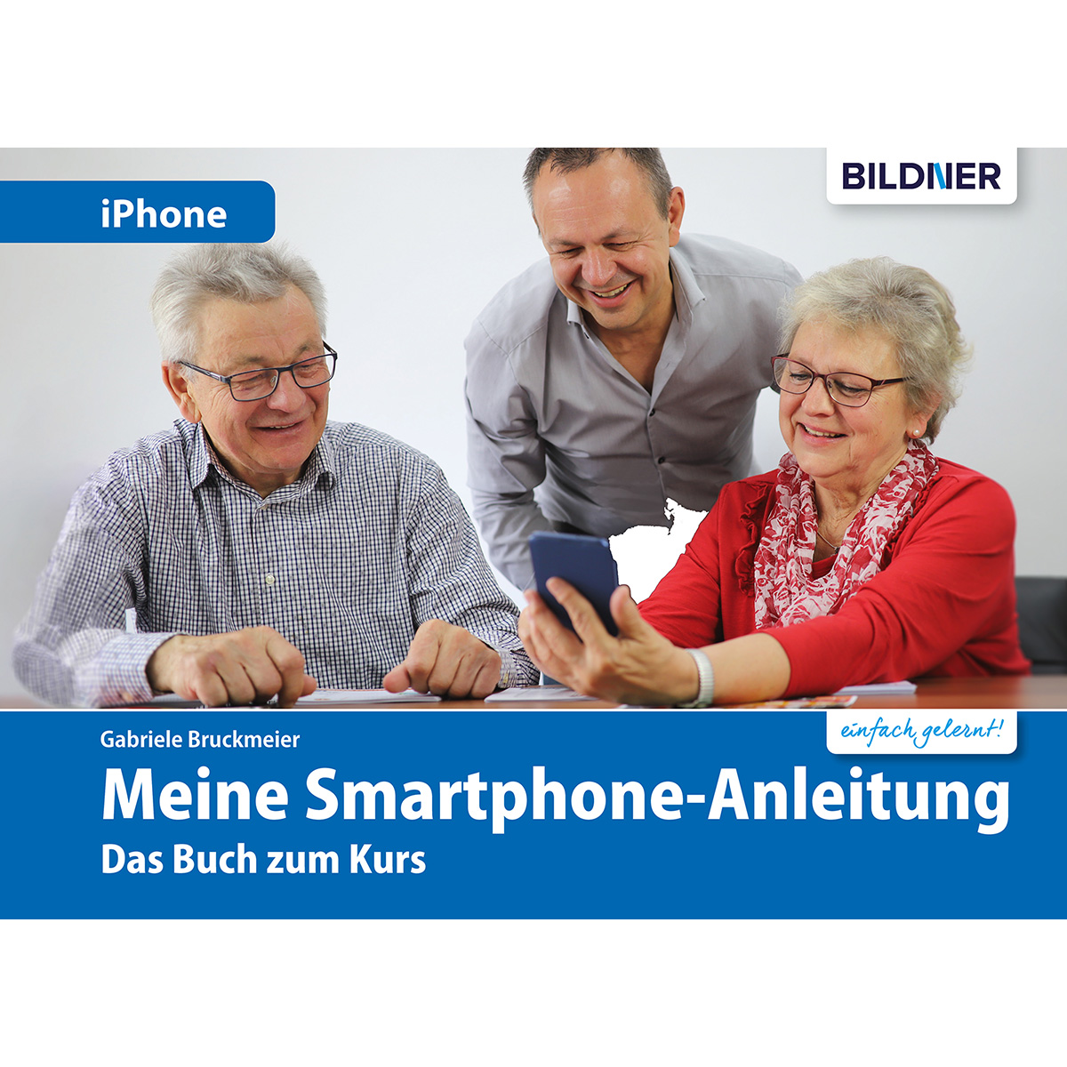 Ein Buch mit dem Titel 'Meine Smartphone-Anleitung' mit Leuten drumherum. Weißer Hintergrund.