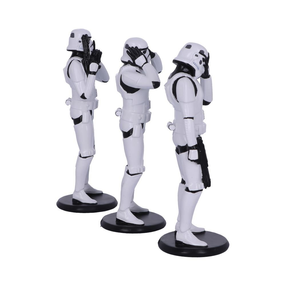 Drei Star Wars Stormtrooper-Figuren in einer „nichts sehen, nichts hören, nichts sagen“-Pose.