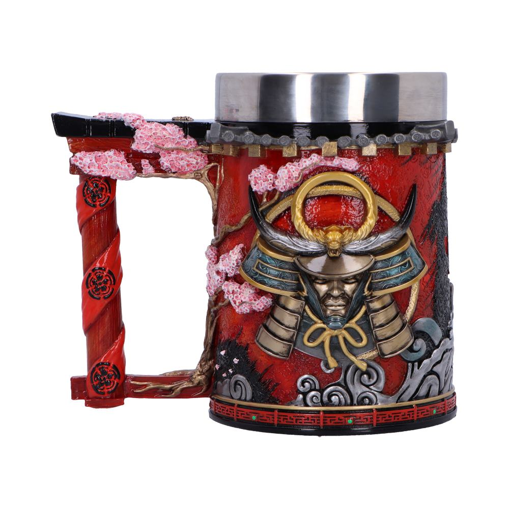 A detailed mug with a samurai theme and a red background with cherry blossoms.