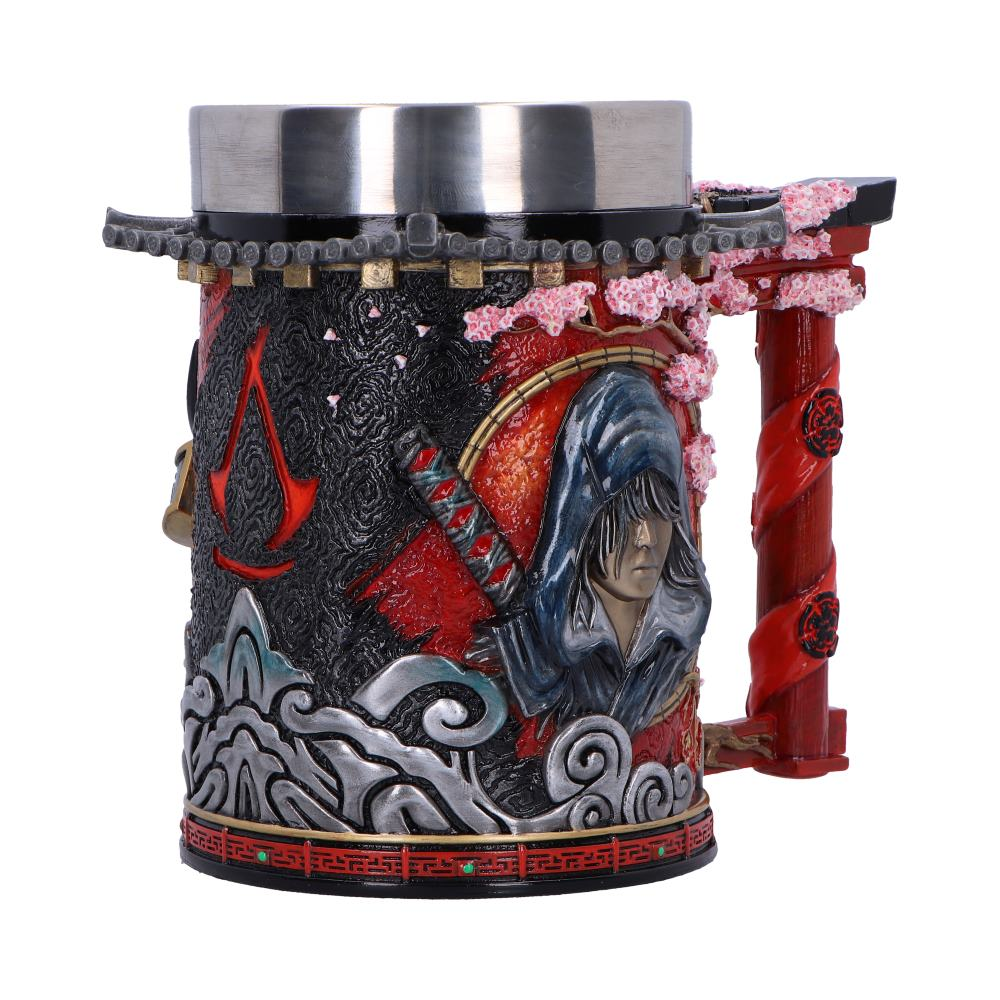 Assassin's Creed tankard with a detailed design featuring a character and a red handle.