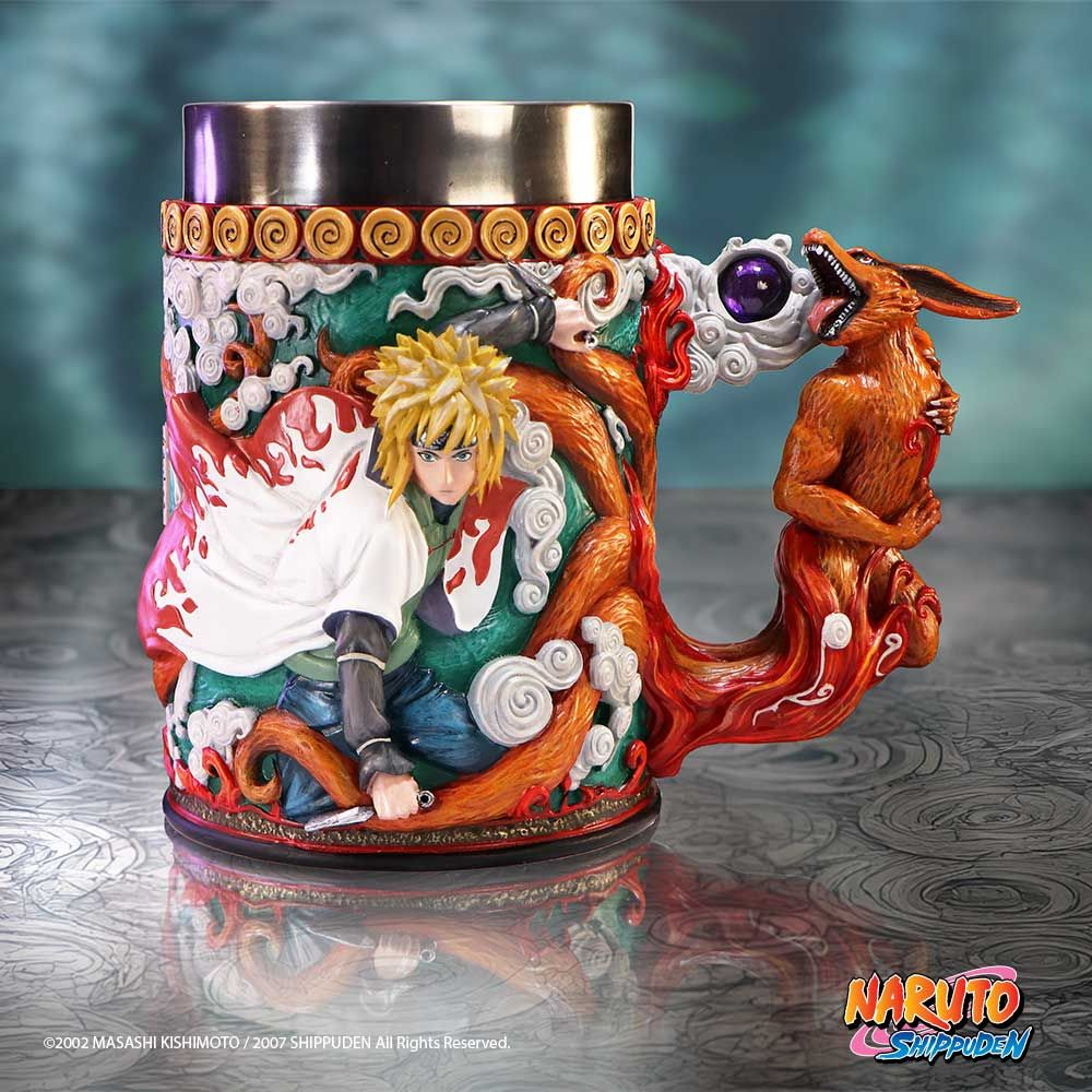 Naruto mug featuring a character with blonde hair and a fox. The mug has an orange tail handle and detailed art.