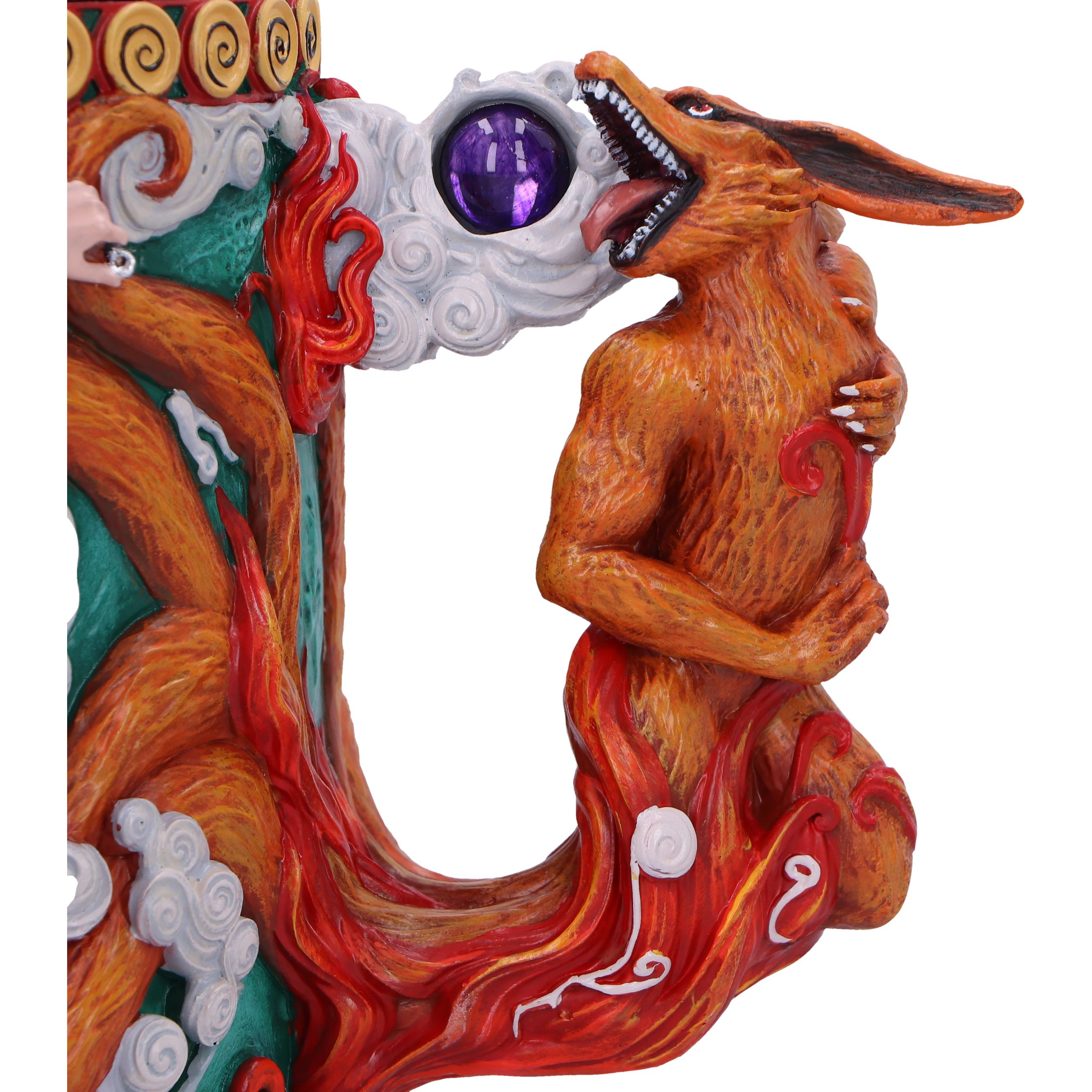 Mug with a fox-like creature handle, the creature's tail wraps around the mug.