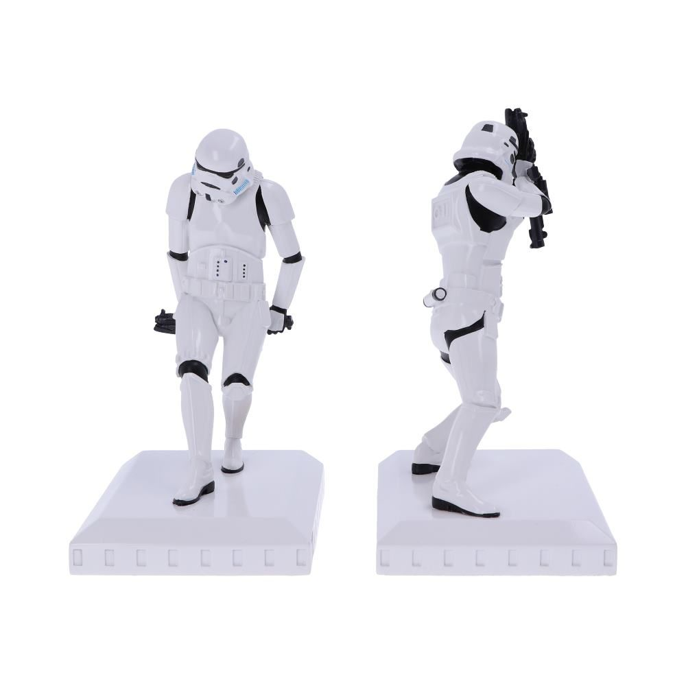 Twee witte Stormtrooper-beeldjes. Eén loopt en de ander richt met een wapen.