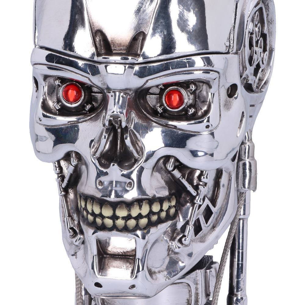 Terminator skull head with red eyes, metallic details, and exposed teeth.