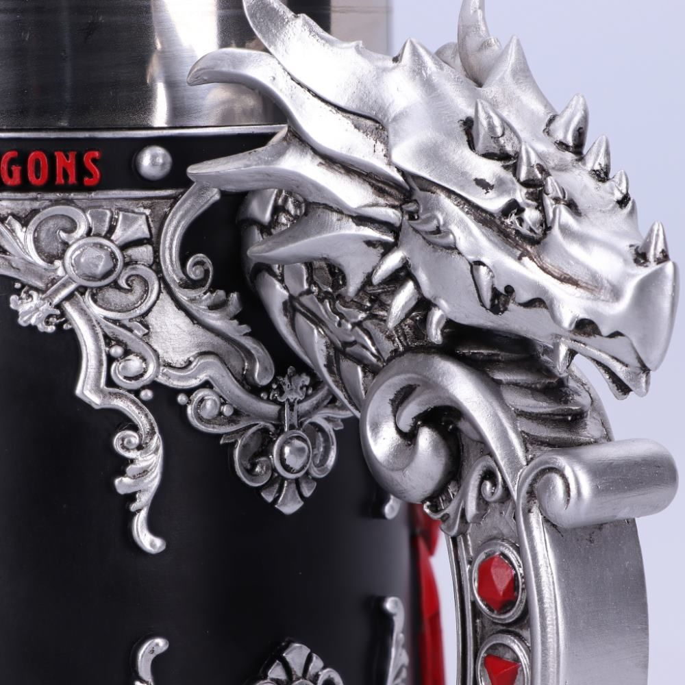 A dragon-themed mug with a dragon head handle, red gems, and black and silver design.