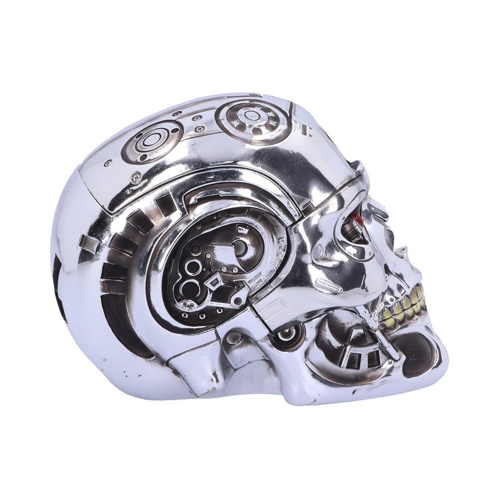 A chrome Terminator skull head with red eyes and yellow teeth, set against a white background.