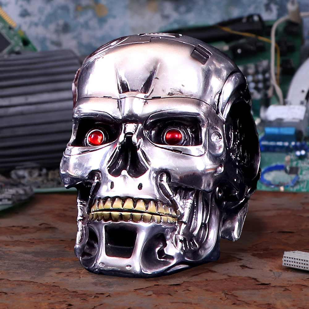 Terminator skull, metallic finish, red eyes, and yellow teeth.