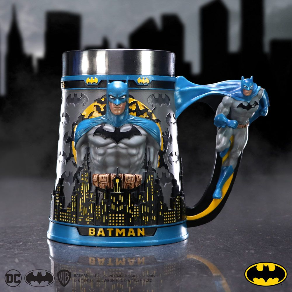 A Batman mug with Batman's image and logo. The mug is black, blue, and yellow.
