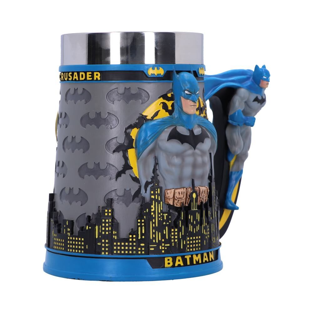 Batman mug with Batman figure on handle and side. Grey cityscape background. Blue and silver.